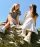 two women posing outside